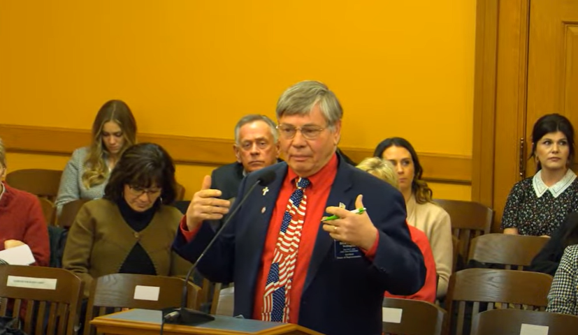 Rep. Bill Rhiley, R-Wellington, urged the Kansas House Transportation Committee to embrace a bill imposing a new battery recharge tax on owners of electric vehicles in response to decline of state gasoline tax revenue used to repair highways. (Kansas Reflector screen capture from Kansas Legislature YouTube channel)
