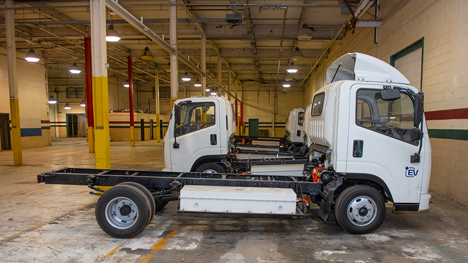 Cab chassis electric trucks wait for assembly with customizable back ends.